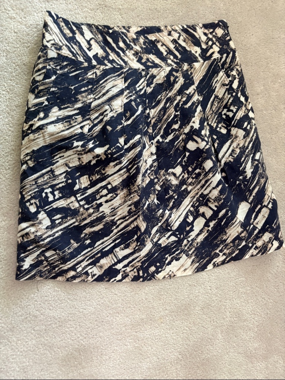 Abstract Print A-Line Skirt in Black & Cream side zipper, hidden side pockets.